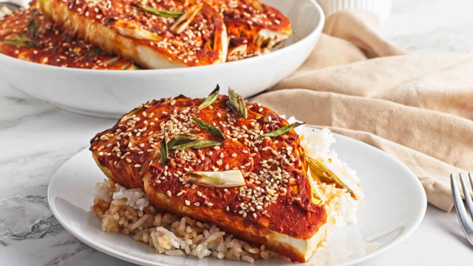 <p>Spice up your dinner with our Gochujang Cabbage Steaks which are crispy, flavorful, and oh-so-delicious. Made with thick slices of cabbage roasted with spicy gochujang sauce, they’re a tasty and nutritious side dish or main course. Serve them alongside rice or grilled meat for a complete and pleasing meal that’s sure to impress.<br><strong>Get the Recipe: </strong><a href="https://twocityvegans.com/gochujang-cabbage-steaks/?utm_source=msn&utm_medium=page&utm_campaign=msn" rel="noopener">Gochujang Cabbage Steaks</a></p> <p>The post <a rel="nofollow" href="https://www.splashoftaste.com/tour-the-world/">Tour The World: 15 Must-try Dinner Recipes</a> appeared first on <a rel="nofollow" href="https://www.splashoftaste.com">Splash of Taste - Vegetarian Recipes</a>.</p>