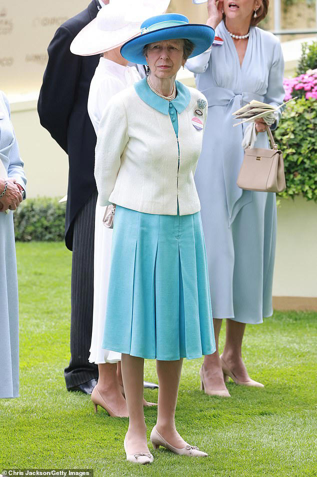 Anne's enduring style: Princess Royal dons favourite aquamarine dress ...