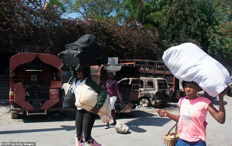 Haiti Gangs Armed With Machine Guns Try To Gain Control Of Airport