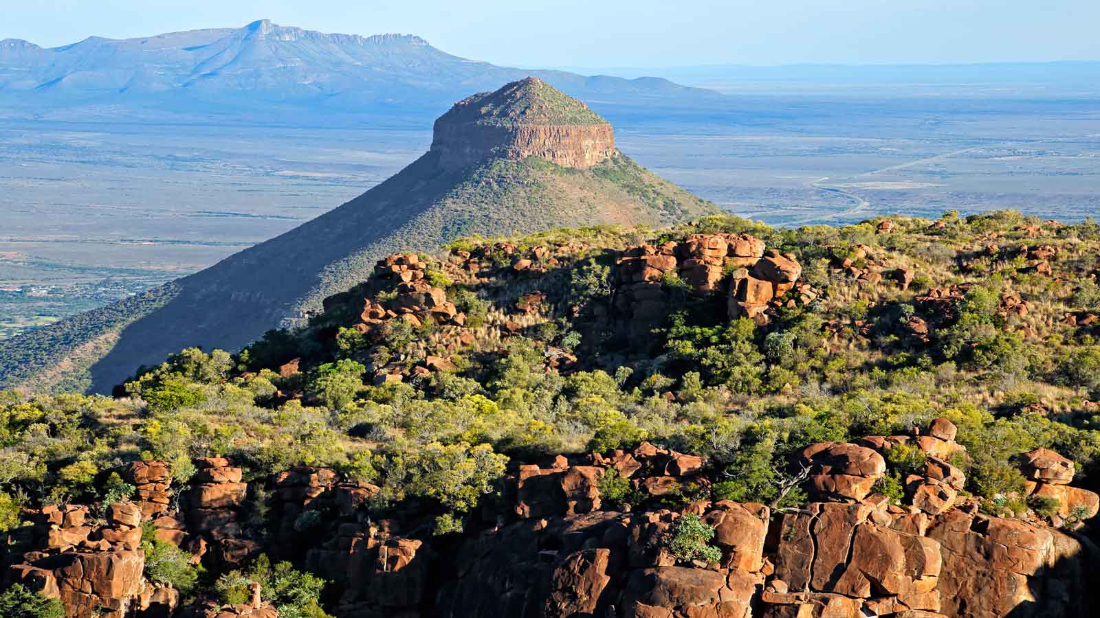 <p>The Valley of Desolation is not on many people’s radars, locals or tourists, but it should be. Just outside one of South Africa’s oldest towns is the <a href="https://www.sanparks.org/parks/camdeboo" rel="nofollow noopener">Camdeboo National Park</a>, a beautiful wildlife reserve with hiking trails, picnic sites, and the Valley of Desolation. The valley has dramatic rock formations that reach 394 feet from the valley floor.</p>