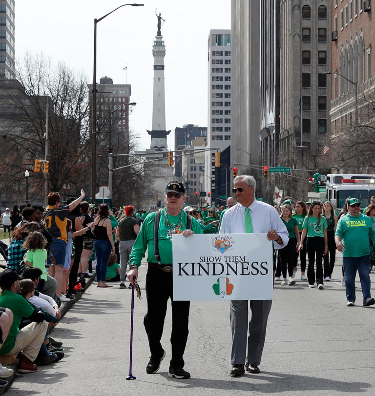 People gather to watch the 40th annual St. Patrick's Day Parade, Thursday, March 17, 2022, in downtown Indianapolis.