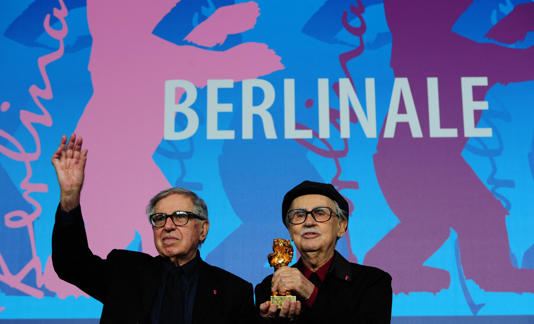 Paolo and Vittorio Taviani celebrate after receiving the Golden Bear award for “Caesar Must Die” at the Berlinale International Film Festival in Berlin in 2012.