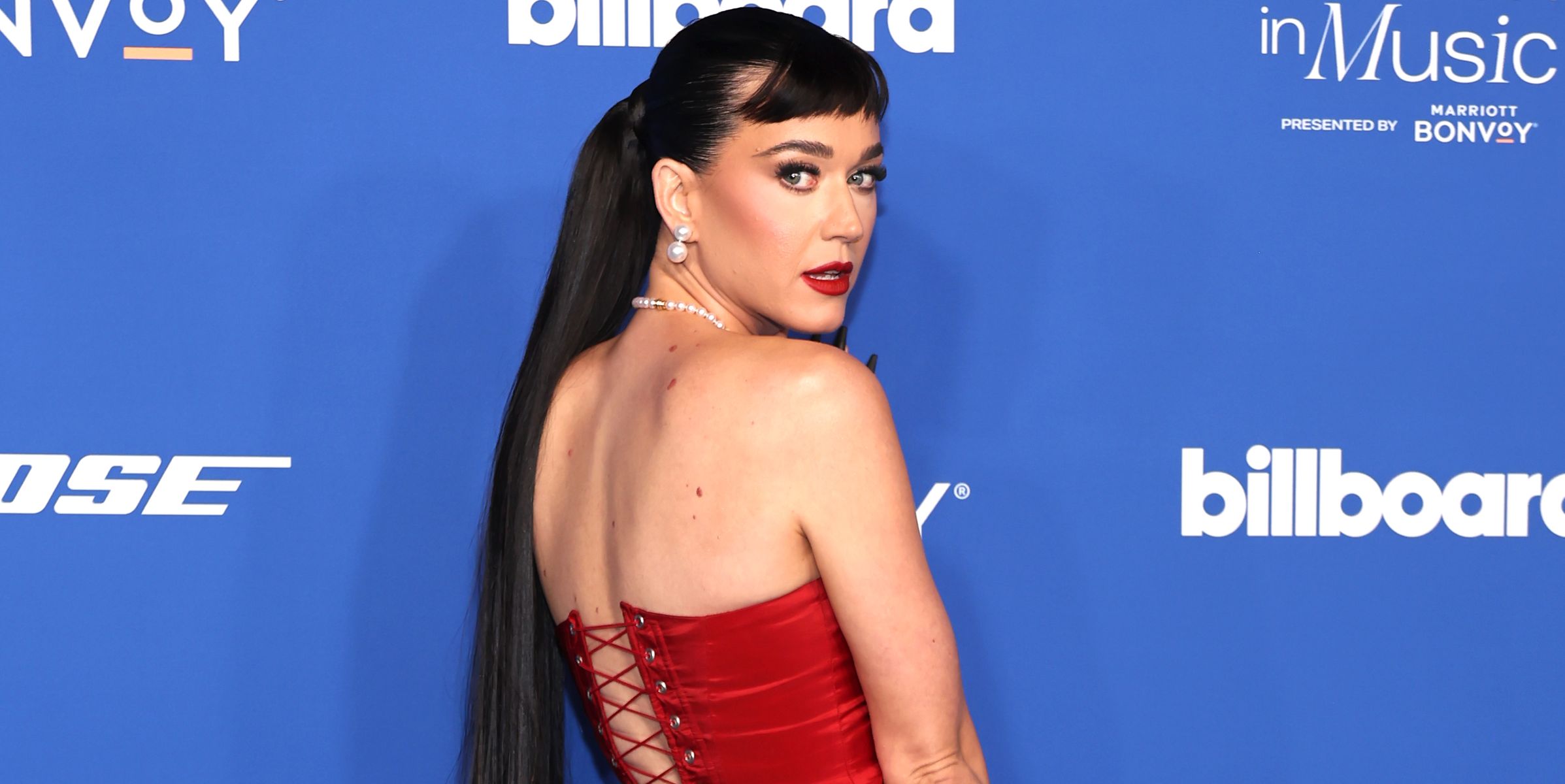 Katy Perry's Lace-up Bum Corset Flashes Her Thong