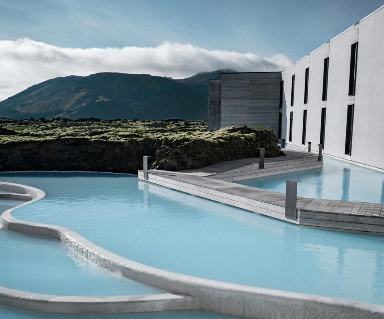 Check out the top tips for a luxury stay in Iceland. Pictured: a luxe hotel in Iceland with shallow turquoise pools