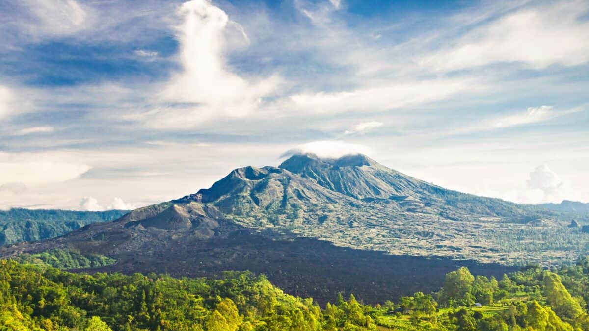 <p> Located in Bali, Mount Batur offers trekkers the chance to witness sunrise from its summit. It’s an active volcano, with its last eruption in 2000, and provides a relatively easy but rewarding hike.</p>