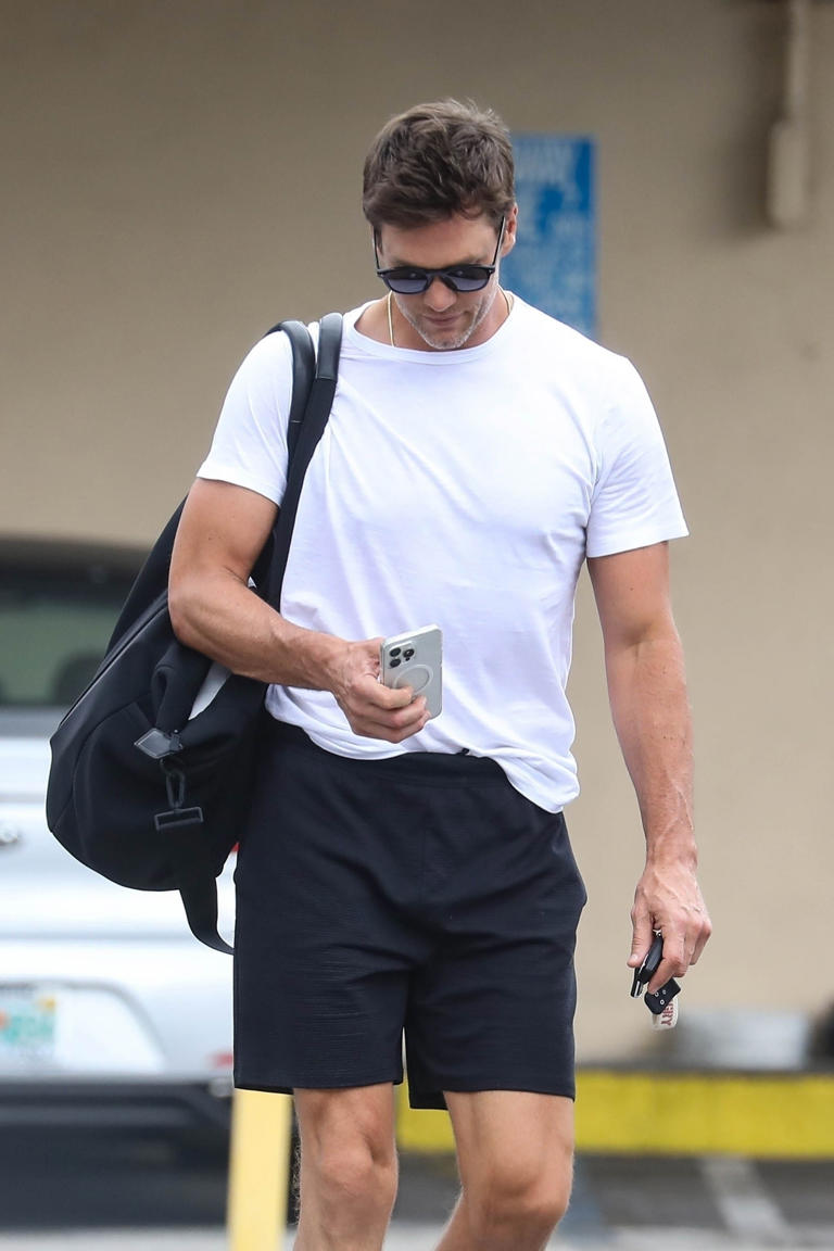 He was leaving a workout with his eyes on his phone. Robert O'Neil/Backgrid / BACKGRID