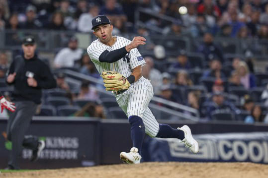 Sep 22, 2023; Bronx, New York, USA; New York Yankees third baseman Oswald Peraza (91) throws the ball to first base for an out during the sixth inning against the Arizona Diamondbacks at Yankee Stadium. Mandatory Credit: Vincent Carchietta-USA TODAY Sports