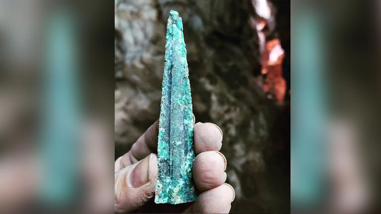 Archaeologists found this bronze dagger among the grave goods for one of the Bronze Age burials in the cave. (Image credit: Antonio Rodríguez-Hidalgo, Instituto de Arqueología de Mérida (CSIC-Junta de Extremadura))