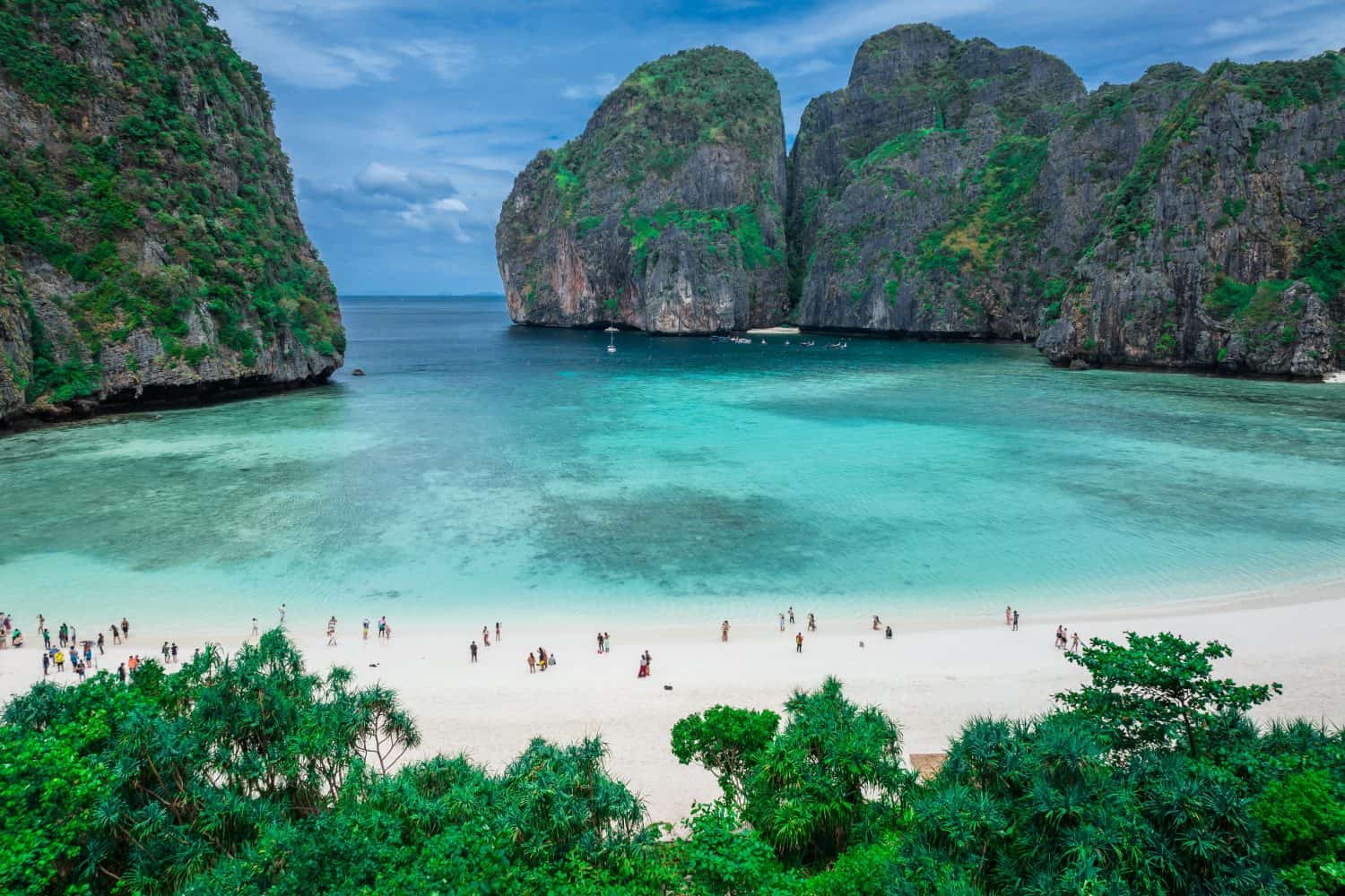 <ul> <li><strong>Location:</strong> Thailand</li> <li><strong>Known For:</strong> 100-meter cliffs and white, sandy beaches</li> </ul> <p>In 2000, Leonardo Decaprio starred in the movie "Beaches," which prompted an influx of travelers to tour Maya Bay, where the movie was filmed. The problem is that the inflow of tourists has caused damage to the ecosystem. As a result, Maya Bay has shut down numerous times to recover.</p>