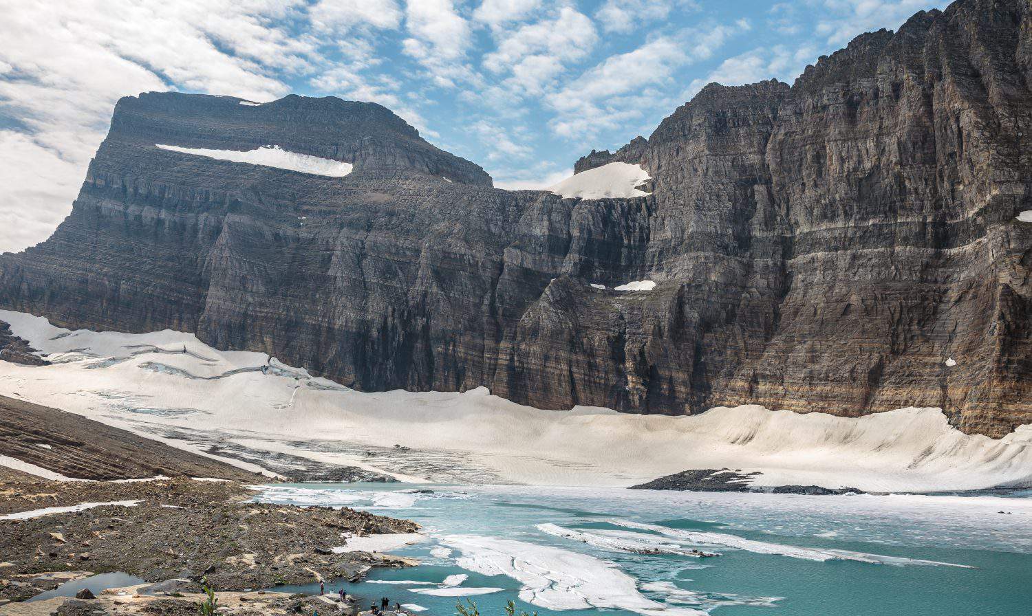 <ul> <li><strong>Location:</strong> Montana</li> <li><strong>Known For:</strong> Beautiful glaciers, trails, valleys, and lakes</li> </ul> <p>The views one takes in while at Montana's Glacier National Park are spectacular. When the Glacier National Park was created in 1910, there was an estimate of around 80 glaciers. Now, <a href="https://www.nps.gov/glac/learn/nature/glaciersoverview.htm">there are only 26 glaciers left</a>, and they are melting fast. Annual mean temperatures have been rising since 1910. While some predict that the glaciers may disappear as soon as 2030, it's also possible that <a href="https://www.nps.gov/glac/learn/nature/glaciersoverview.htm">they will stick around longer</a>.</p>
