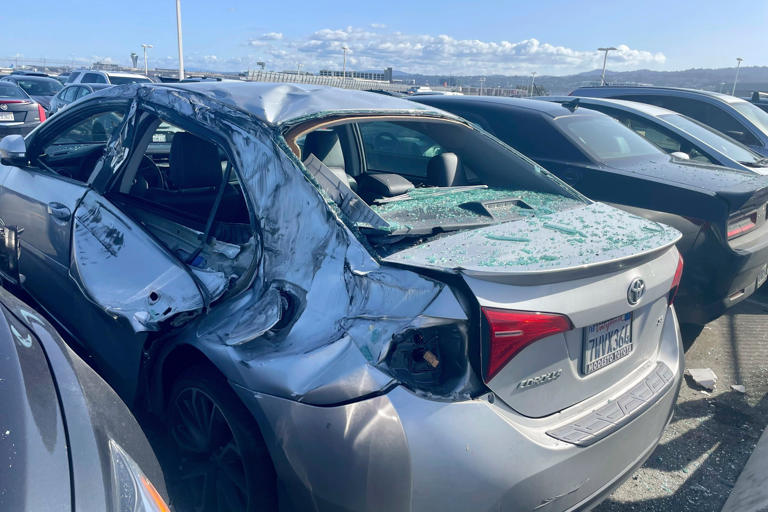 Wheel falls off United Airlines Boeing 777 and crushes cars in San ...