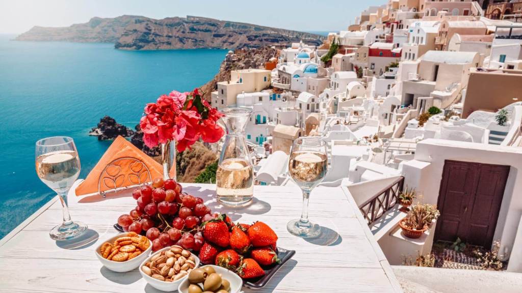 <p>One of the most overlooked things to do in Santorini is to indulge in the rich culture and history surrounding the production of Assyrtiko wines. When visiting, spare time to savor Assyrtiko wines, known for crisp acidity, citrusy flavors, and distinctive mineral notes. </p><p>For top-notch wine-tasting tours, book trips with famous wineries such as Santo Wines, Gaia Wines, and Domaine Sigalas. You may also want to consider Venetsanos Winery, which offers an excellent experience featuring panoramic views of the Aegean Sea and the island’s picturesque landscapes. </p><p>Finish your wine tour by exploring the island’s vineyards, which are situated on picturesque volcanic slopes. Pyrgos, Megalochori, and Oia are just a few vineyards you can visit.</p><p class="has-text-align-center has-medium-font-size">Read also: <a href="https://worldwildschooling.com/must-visit-greek-islands/">Must-Visit Greek Islands</a></p>