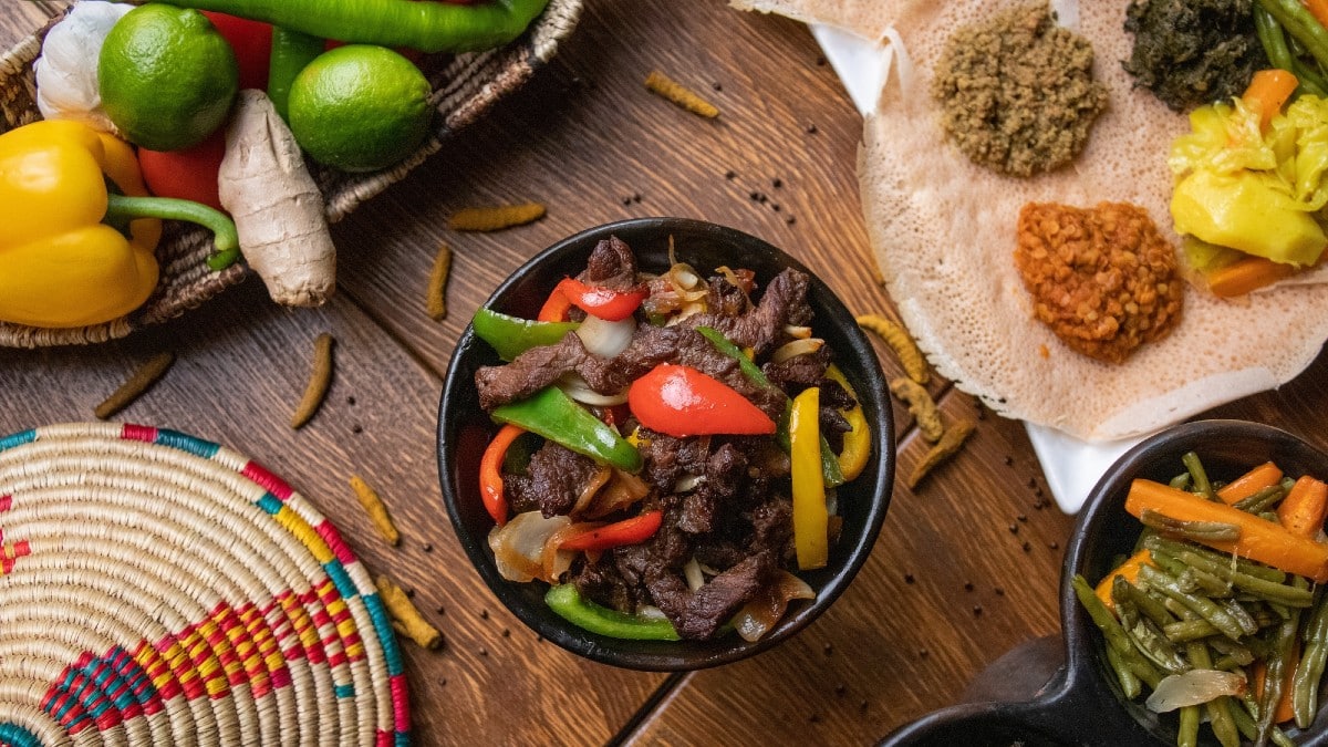 <p><span>Daring palates find a home in Ethiopia. Injera, with its sour tang and nutrient-packed teff flour, lays the foundation for colorful stews. </span><span>This is more than eating; it's an experience of communal connection, inviting a hands-on approach to dining that's deeply human.</span></p>