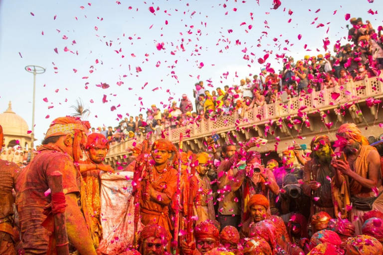 Phoolon Ki Holi in Vrindavan, Uttar Pradesh, offers a truly enchanting way to celebrate this vibrant festival. (Image: Shutterstock)