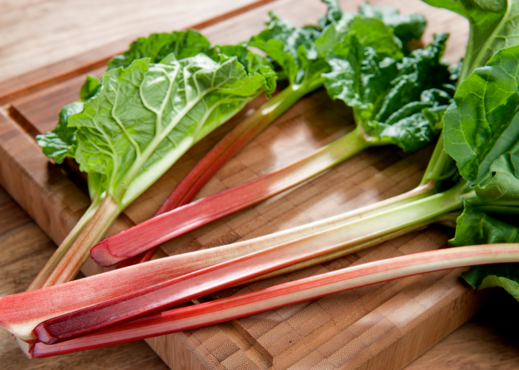 <p>Although humans love rhubarb pies, the sweet treat can cause kidney failure in dogs due to an antinutrient called oxalic acid. The substance <a href="https://www.heritageanimalhospital.com/blog/?tag=rhubarb">creates crystals in the urinary tract</a> and can cause the kidneys to shut down. Signs of rhubarb poisoning can include drooling, vomiting, diarrhea, tremors, bloody urine, changes in thirst, and other symptoms.</p>