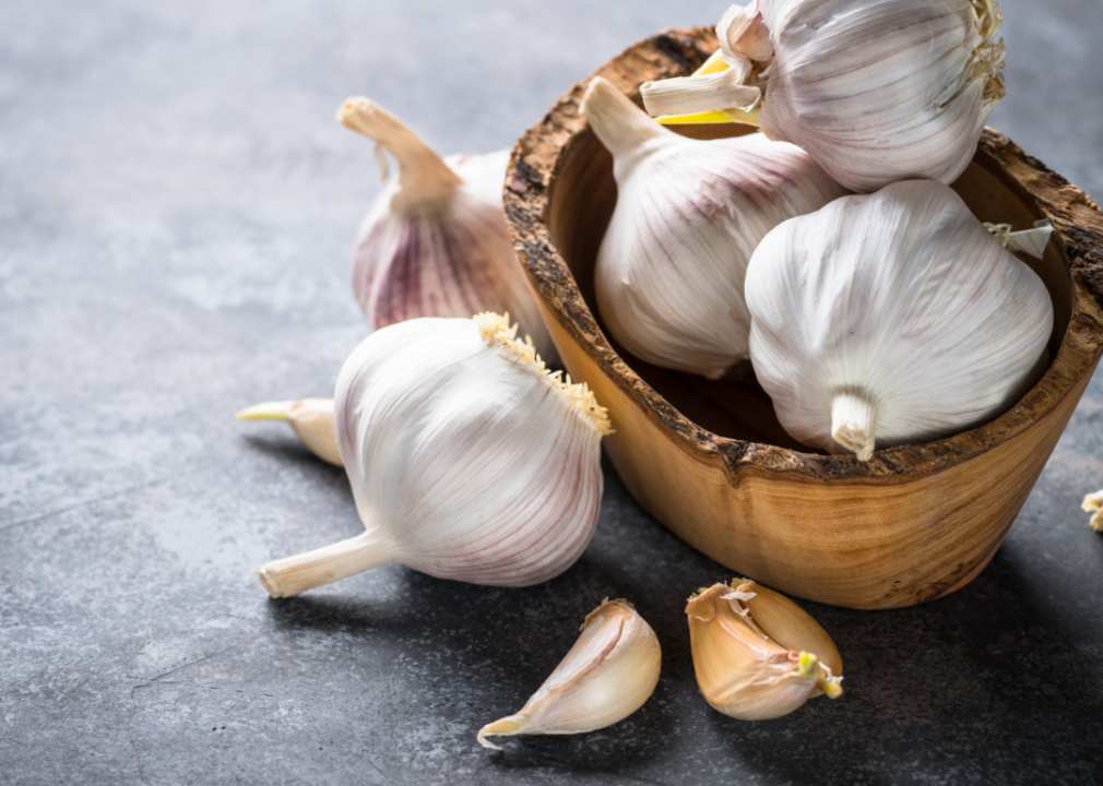 <p>Garlic is an allium, a family of foods that can be fatal to dogs due to a compound called thiosulfate that damages red blood cells. It takes a lot of garlic to cause toxicity but some breeds, particularly Japanese ones (such as Akitas and Shiba Inus), are particularly susceptible. "<a href="https://www.petpoisonhelpline.com/poison/garlic/">Signs of garlic poisoning can be delayed</a> and not apparent for several days," explains the Pet Poison Helpline. "While tiny amounts of these foods in some pets, especially dogs, may be safe, large amounts can be very toxic."</p>
