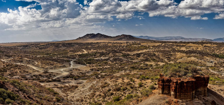 Tanzania’s Olduvai Gorge, world-famous for its Stone Age archaeology, is one of the likely areas where humans first began to speak (Creative Commons)
