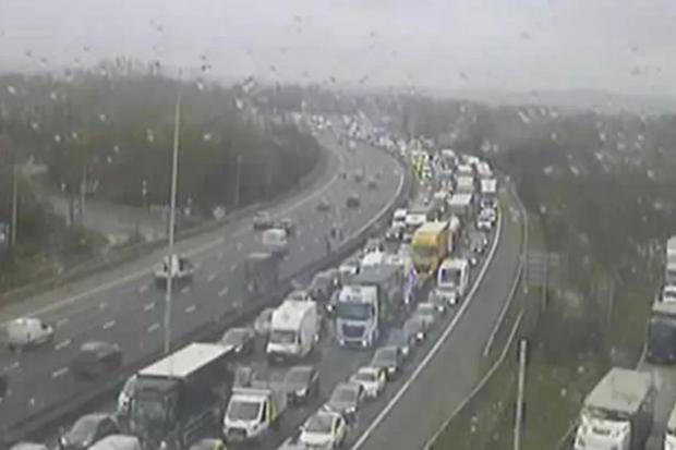 Van driver in his 70s dies after crash with lorry on M25