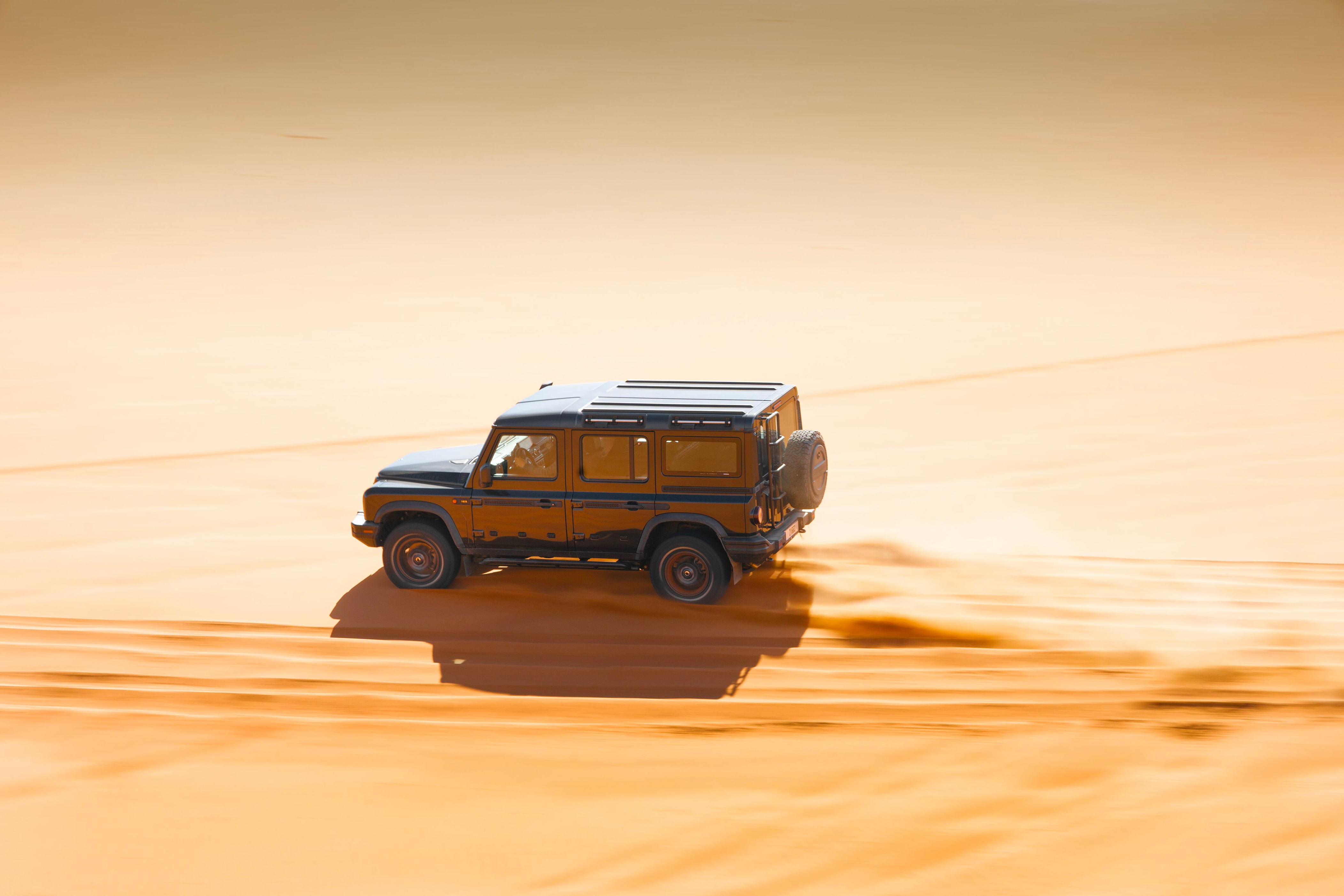 ineos grenadier road test: ogre-sized 4x4 crosses dubai desert like a ballerina