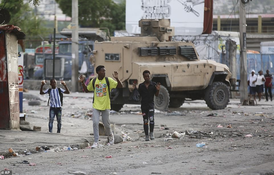 Haitian vigilantes hit back at the gangs as power stations are struck