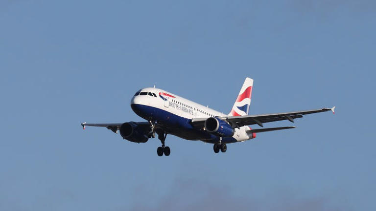 A photo of a British Airways Airbus landing at London City Airport. 