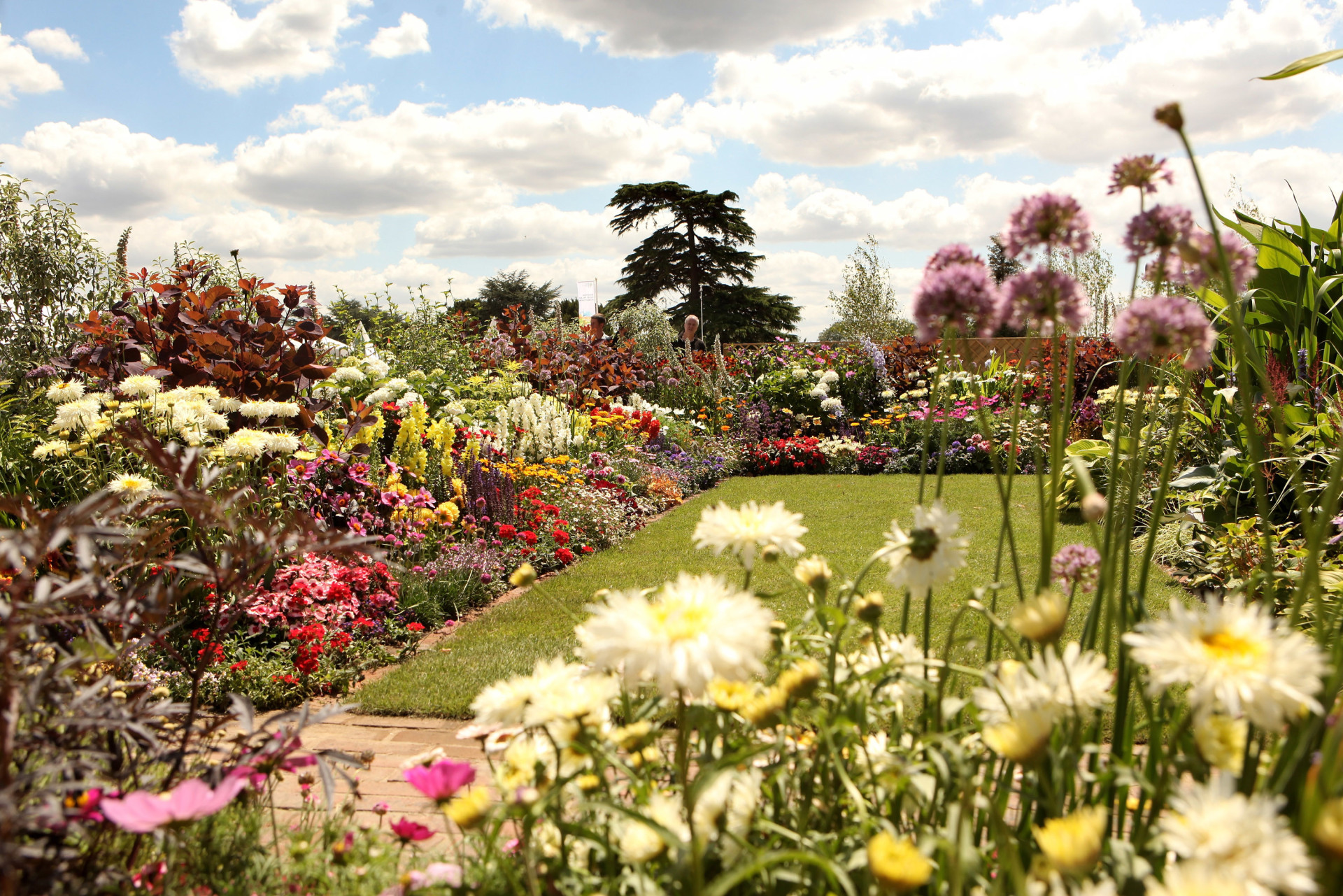Visitors can get lost in the maze gardens surrounding Henry VIII’s famed palace.