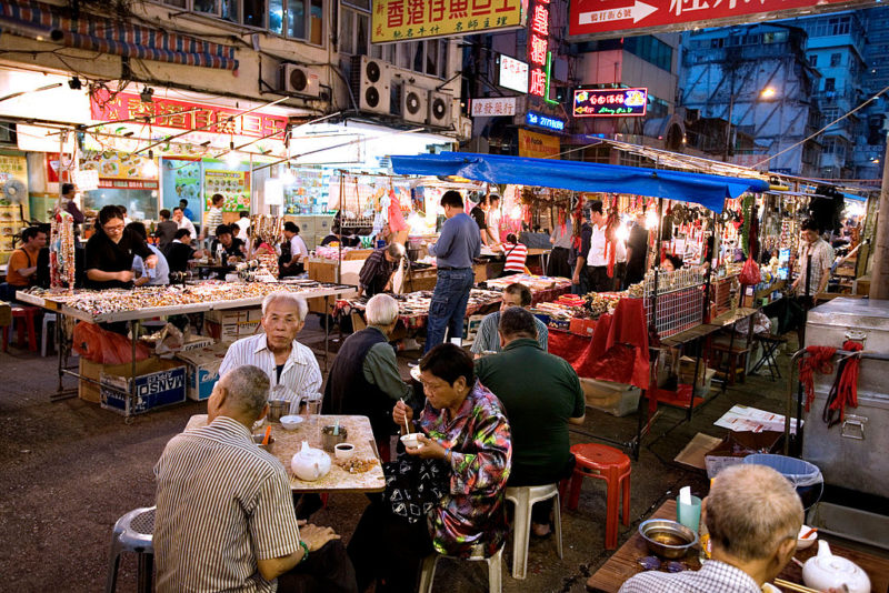 <p>Night markets in Hong Kong first began to give people something to do after work. They've grown into popular attractions, though, that draw both tourists and locals. One of the best-known occurs on Temple Street.</p> <p>The Temple Street Market features all the food that one could ever hope to eat. There are also fortune-telling parrots and jade jewelry that can ward off evil. Lucky tourists may even be treated to a performance by the Cantonese Opera House.</p>