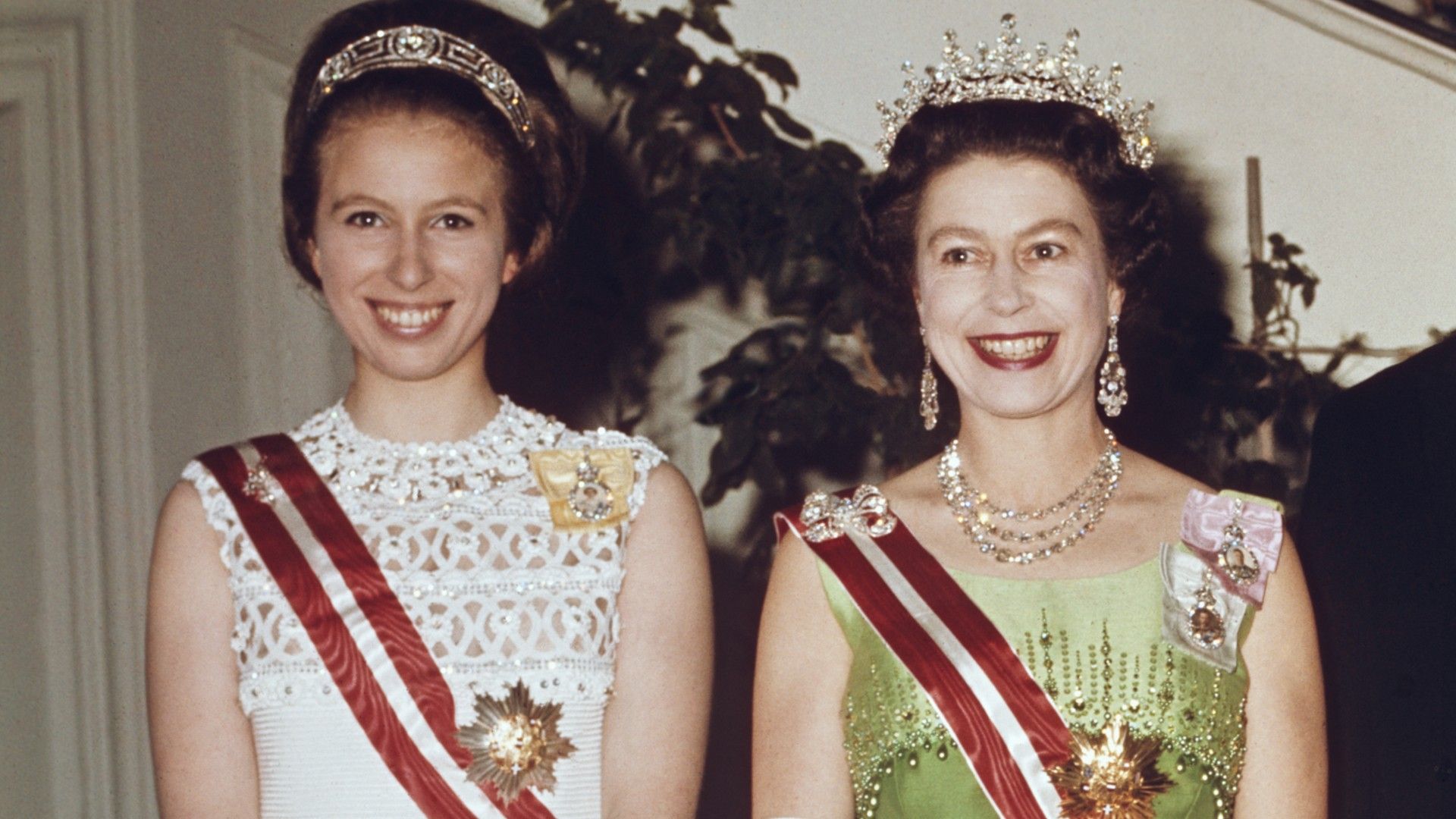 <p>                     In 1969, the Queen, Prince Philip, and their only daughter, Princess Anne, undertook a visit to Austria. The family started their tour in Vienna, where they visited the Spanish Riding School, took in a Horse Show, and attended a glamorous Gala Reception held by the Austrian President at the time, Franz Jonas.                   </p>                                      <p>                     But arguably the highlight of the proceedings in Vienna was when Anne, the Queen and Philip hosted a Return Banquet for the Austrian President. For the special evening, both Anne and her mother coordinated brilliantly in some fantastically glamorous outfits and tiaras.                   </p>                                      <p>                     While Anne wore a seriously chic white gown and tiara, the Queen matched her daughter in a stunning green ensemble, and the glittering Girls of Great Britain and Ireland Tiara, making for an iconic fashion moment.                   </p>