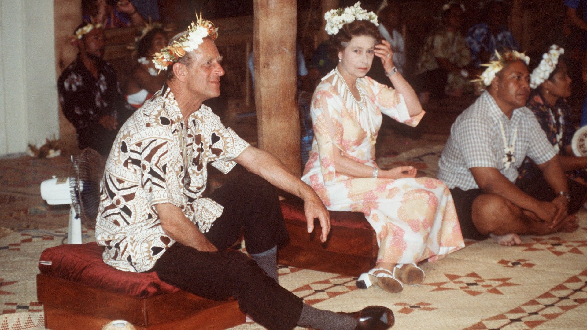 <p>                     In 1982, the Queen and her husband paid a visit to the island country of Tuvalu, in the South Pacific – the country formerly known as the Ellice Islands.                   </p>                                      <p>                     The couple spent two days in Tuvalu, during which they enjoyed a feast of traditional local dishes at a banquet which saw them seated on the floor and wearing floral headpieces; a rather unusual sight for the usually very formal Queen and her husband.                   </p>                                      <p>                     During their trip, the royal couple also ceremonially installed a piece of concrete at a future Parliament building. To mark the visit, a range of commemorative stamps were issued by the Tuvalu Philatelic Bureau. Since that visit, both King Charles and the Prince and Princess of Wales have visited Tuvalu too.                   </p>