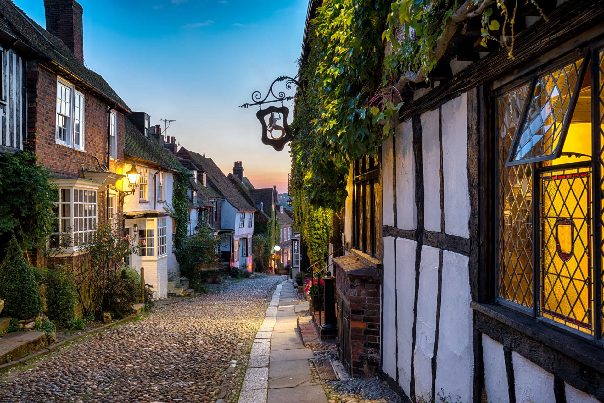 <p>Rye in East Sussex is a great little town with beautiful 15th-century buildings with special dark wood framing. On a quaint weekend away, you can go exploring its adorable alleyways and go shopping in its well-known vintage shops.</p>