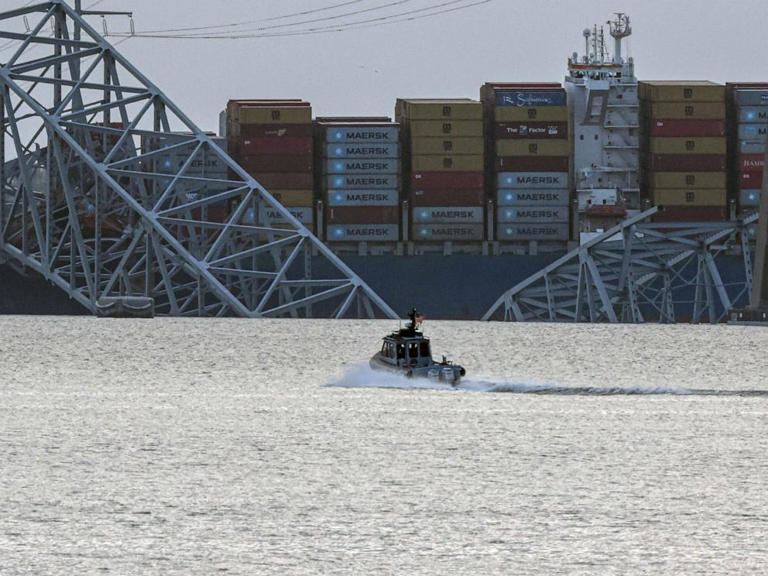 The collapsed Francis Scott Key Bridge is shown after being struck by a cargo ship on March 26, 2024 in Edgemere, Md.