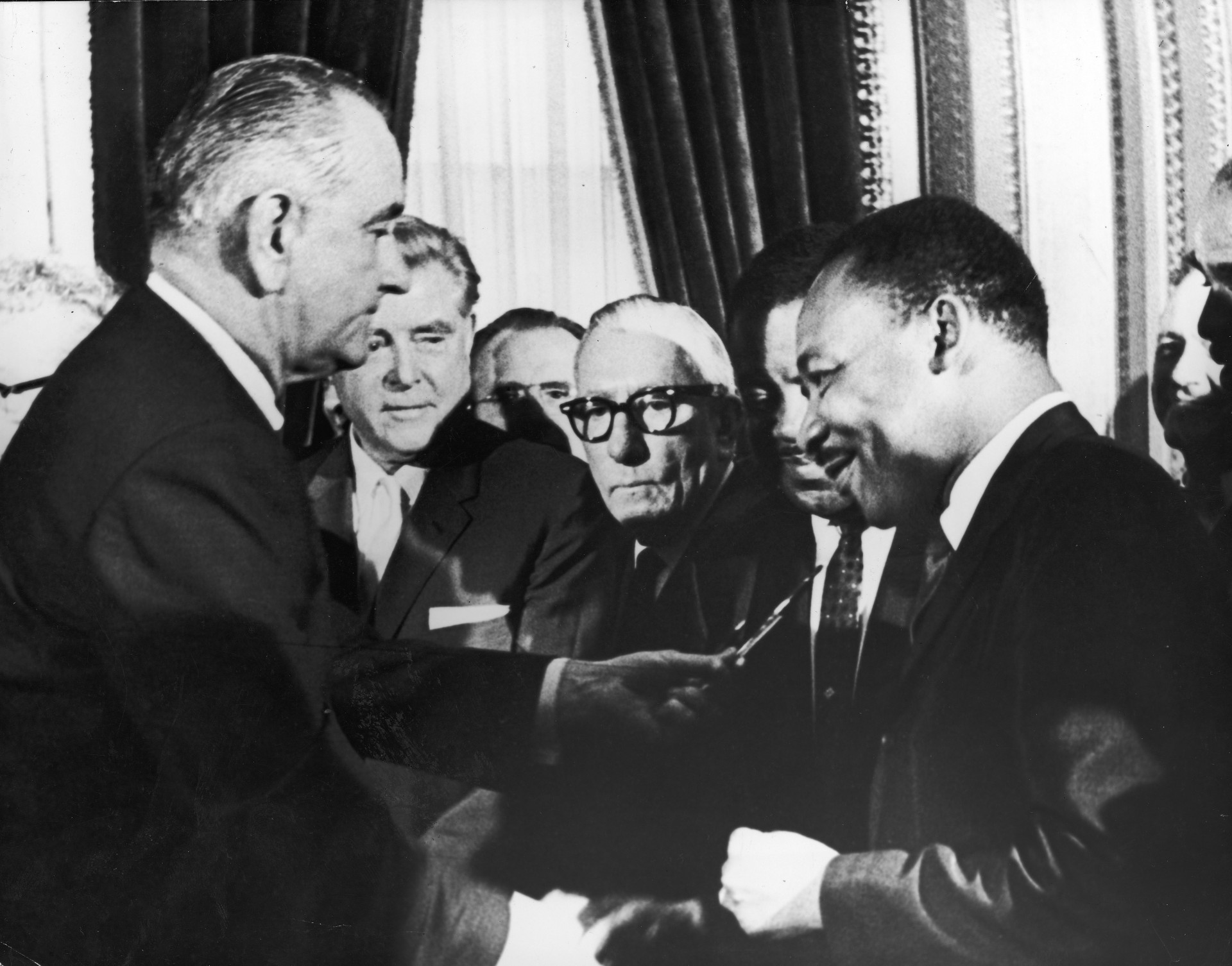 The Civil Rights Act of 1964 was signed into law by President Lyndon B. Johnson at the White House. He is pictured presenting King with the pen used to sign off on the historic document.<p><a href="https://www.msn.com/en-us/community/channel/vid-7xx8mnucu55yw63we9va2gwr7uihbxwc68fxqp25x6tg4ftibpra?cvid=94631541bc0f4f89bfd59158d696ad7e">Follow us and access great exclusive content every day</a></p>