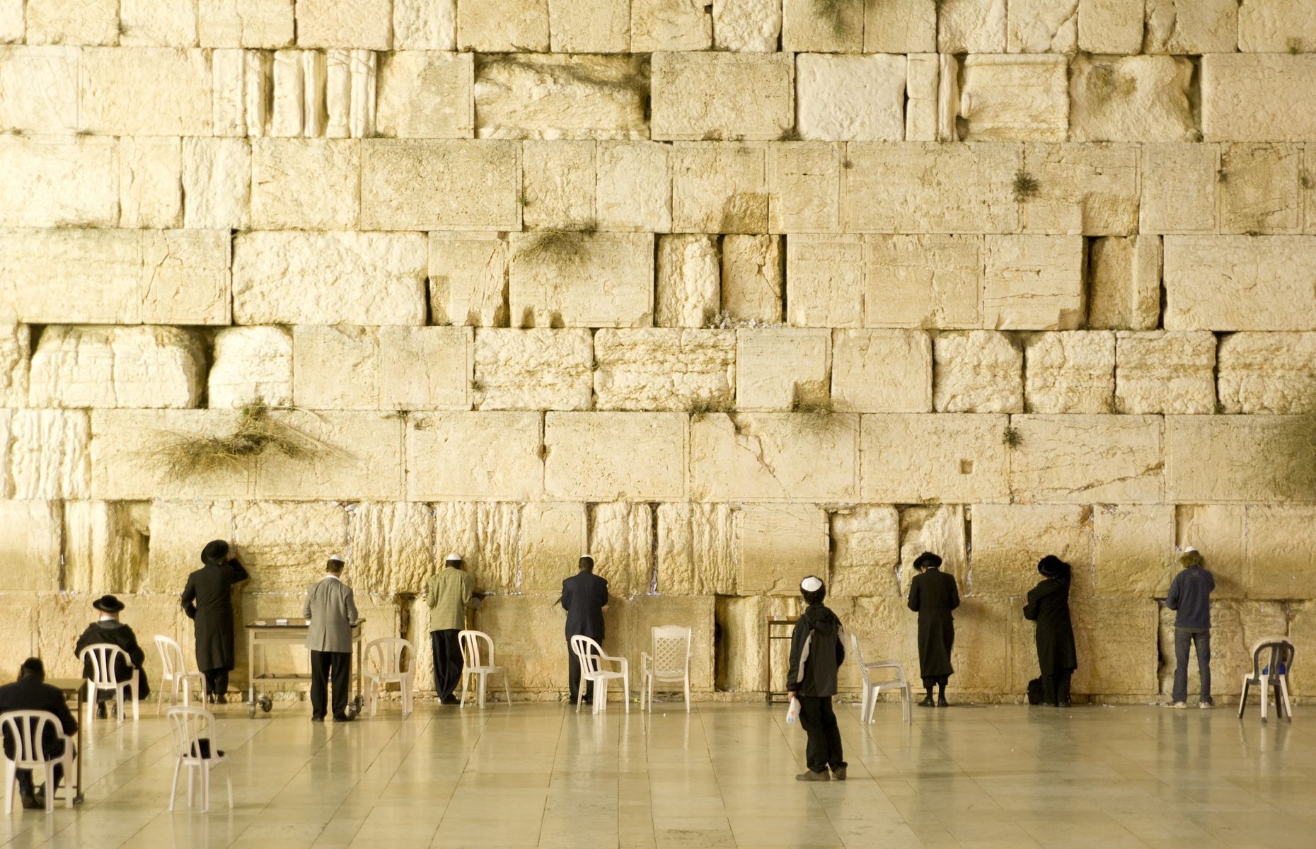<p>The Wailing Wall is the only surviving portion of Jerusalem’s <a href="https://www.mfa.gov.il/mfa/aboutisrael/history/pages/history-%20the%20second%20temple.aspx" rel="noreferrer noopener">Second Temple</a>, destroyed by Rome in the year 70. The remnant remains a sacred site for Jews. <a href="https://www.touristisrael.com/western-wall/15946/" rel="noreferrer noopener">Thousands of people come to the prayer areas, segregated by gender, every day</a>, while record numbers visit on Jewish holidays. Tourists can also access the site, except on Shabbat. According to tradition, visitors write their wishes on a piece of paper and bury them in the crevices of the wall.</p>