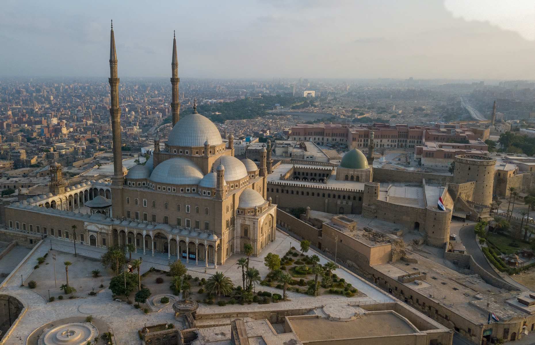 <p>If there’s one mosque that immediately catches the eye in Egypt’s capital, nicknamed the “<a href="https://www.unesco.org/archives/multimedia/document-874" rel="noreferrer noopener">city of a thousand minarets</a>,” it’s the one known as Muhammad Ali. Nestled on top of a hill with a panoramic view of the city, this Ottoman-style structure was built in the 19th century within the walls of Saladin’s Citadel alongside older mosques and medieval fortifications. The site is Cairo’s <a href="https://theankh.net/egypt-destinations/cairo-citadel-saladin-mohamed-ali/" rel="noreferrer noopener">most visited Islamic complex</a>.</p>