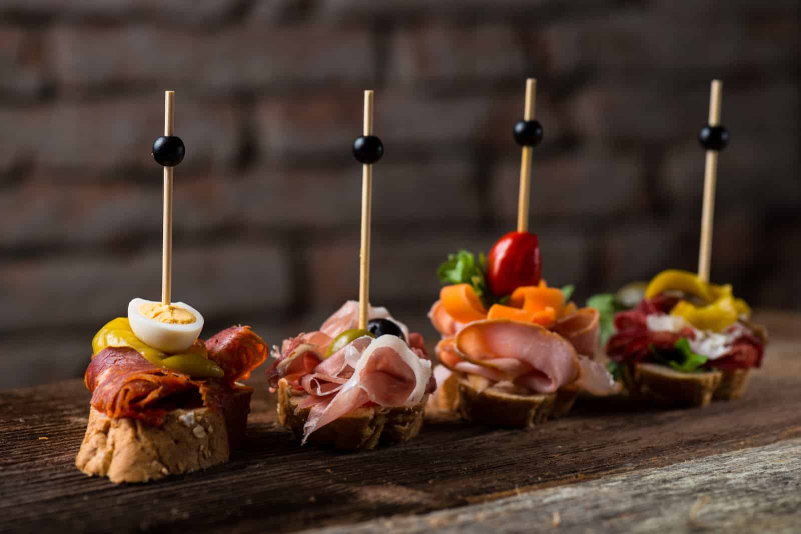 Image Credit: Shutterstock / Visionsi <p><span>Explore the fascinating origins of tapas, tracing back to ancient Spain, where these small plates were initially used as covers to protect drinks from fruit flies. Discover how this humble tradition evolved over centuries into a beloved culinary phenomenon celebrated around the world.</span></p>