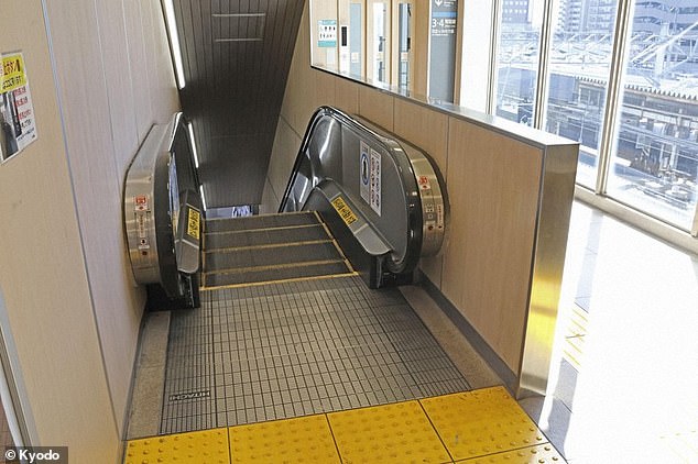 man, 72, is killed by escalator after getting his suit jacket caught in handrail
