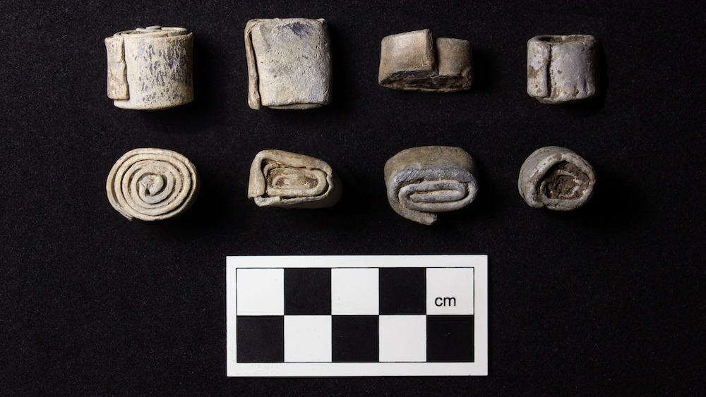 'richly decorated' roman villa with 'curse tablets' and tiny axes unearthed in england