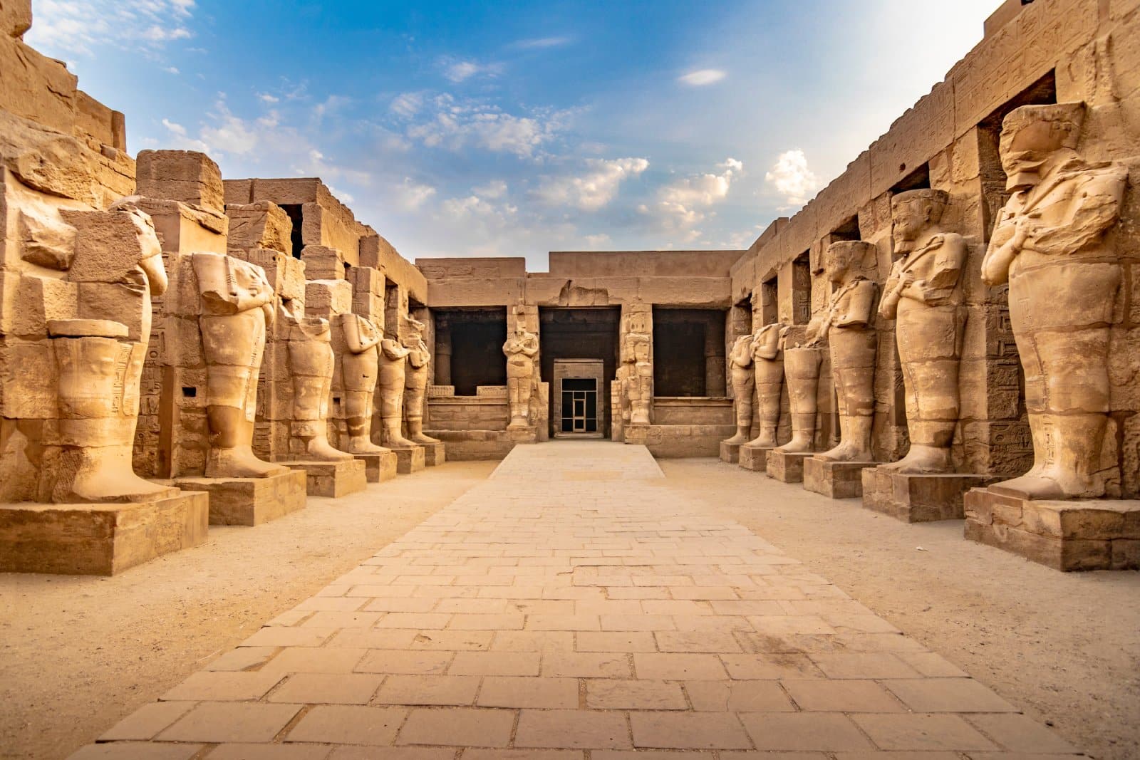 <p class="wp-caption-text">Image Credit: Shutterstock / Bist</p>  <p><span>Luxor, often called the world’s greatest open-air museum, holds treasures beyond time. At its heart, the Karnak Temple complex, a vast open-air museum of decayed temples, chapels, pylons, and other buildings primarily dedicated to Amun, highlights the religious devotion spanning over two thousand years. Walking through the Great Hypostyle Hall, with its towering columns inscribed with hieroglyphs, one can’t help but feel dwarfed by the ancient architects’ ambition and skill. Across the Nile, the Valley of the Kings offers a stark contrast with its hidden underground tombs, where the pharaohs of the New Kingdom period were laid to rest amidst riches and elaborate decorations intended for their journey into the afterlife. The tombs, including that of the young pharaoh Tutankhamun, reveal exquisite artistry and deep religious beliefs, offering a poignant glimpse into the Egyptians’ views on mortality and immortality.</span></p>