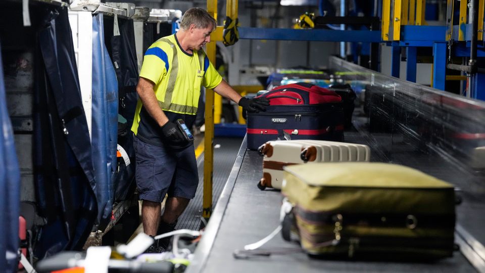 why do airlines charge so much for checked bags? this obscure rule helps explain why