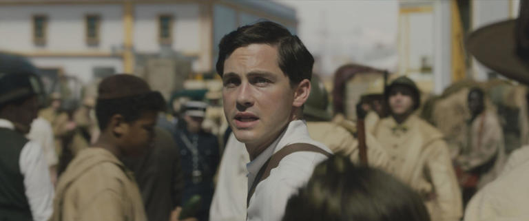 Actor Logan Lerman plays author Georgia Hunter's Holocaust survivor grandfather in the Hulu adaptation of her 2017 novel We Were The Lucky Ones.