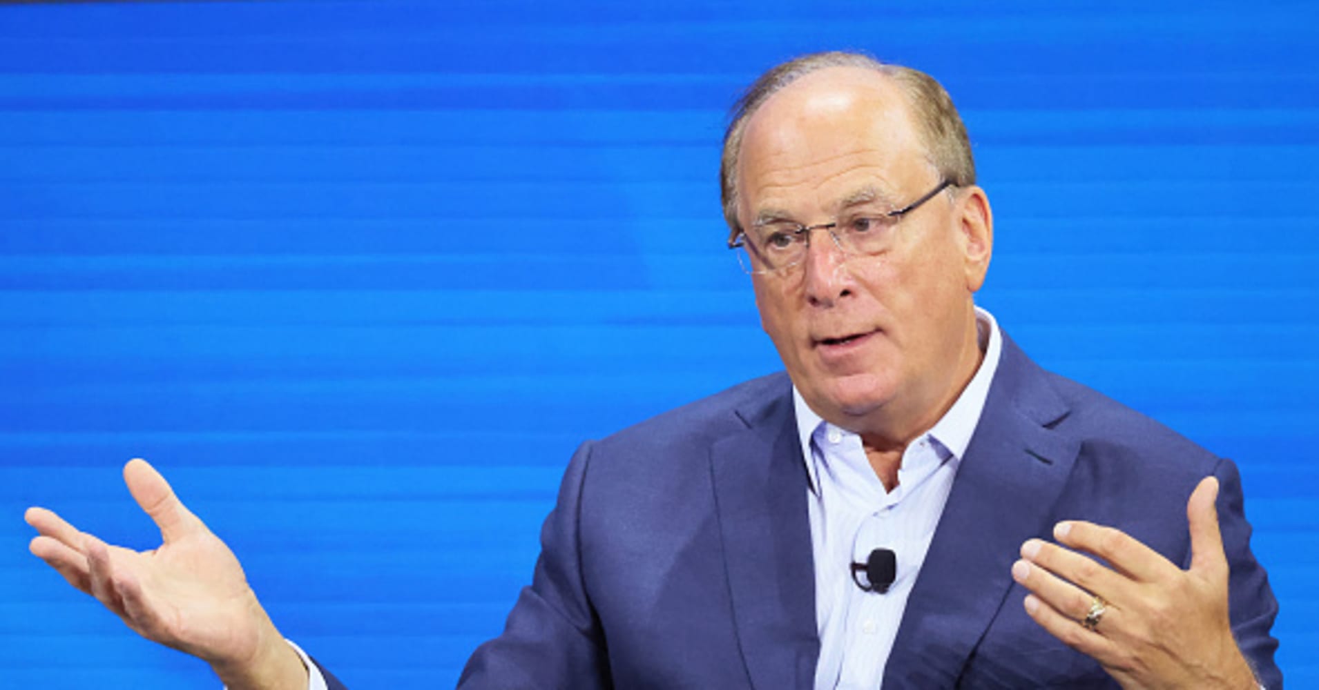 blackrock ceo larry fink says 65 retirement age is too low. here's what experts say