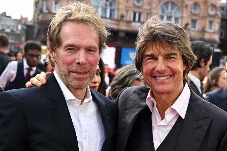 Gareth Cattermole/Getty Jerry Bruckheimer and Tom Cruise on June 22, 2023