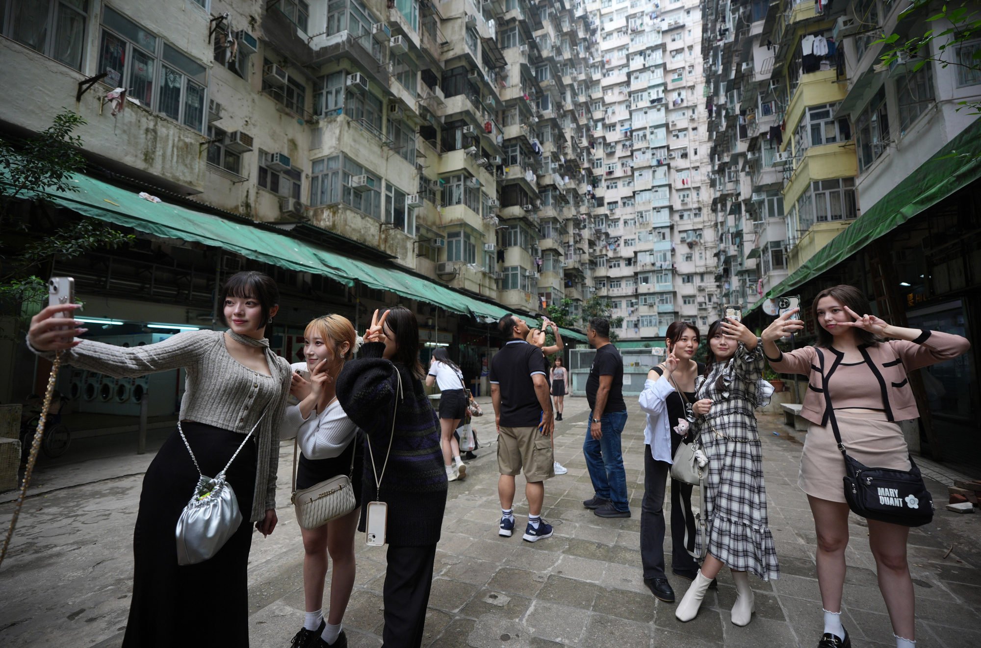 what is drawing tourists to hong kong? koreans seek ‘old city vibes’, filipinos eye disneyland and thais tour temples