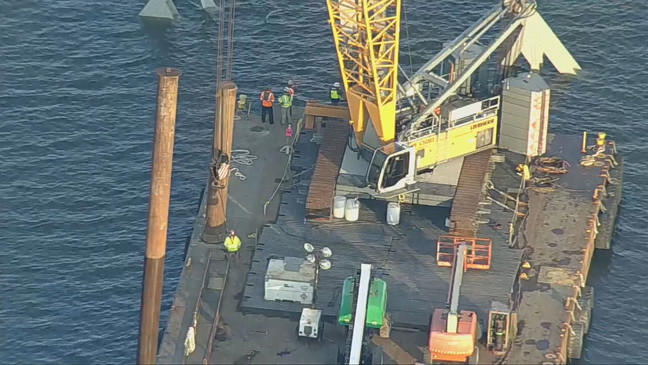 Massive crane, salvage operation underway to clean up collapsed ...