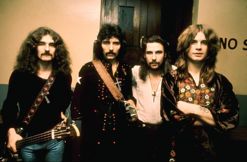 There are plenty of critics and rock historians who credit Black Sabbath as being the first true heavy metal band. When listening to classics like “Paranoid” or “Iron Man,” and brilliant a self-titled debut album from 1970, it’s easy to see why. From Ozzy Osbourne’s sinister voice to Tony Iommi’s blistering, and innovative guitar work (down-tuning his instrument), Sabbath laid the blueprint for heavy, melodic rock and roll that would. That, in turn, influenced greats from Iron Maiden to Slayer to Primus to Korn. Basically, any band that cranked their amps to “11,” and had success doing so.