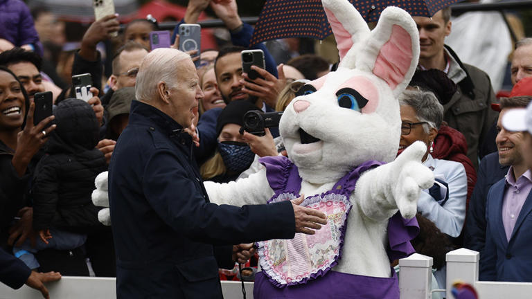 U.S. President Joe Biden and a performer dressed as the Easter Bunny during the Easter Egg Roll on the South Lawn of the White House in Washington, D.C., U.S., on Monday, April 18, 2022.