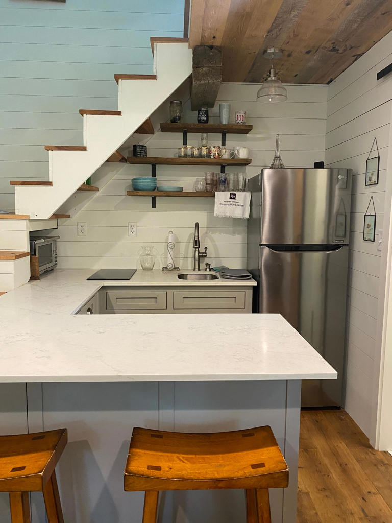 Matson's tiny house kitchen has lots of storage space. Courtesy of Mckean Matson