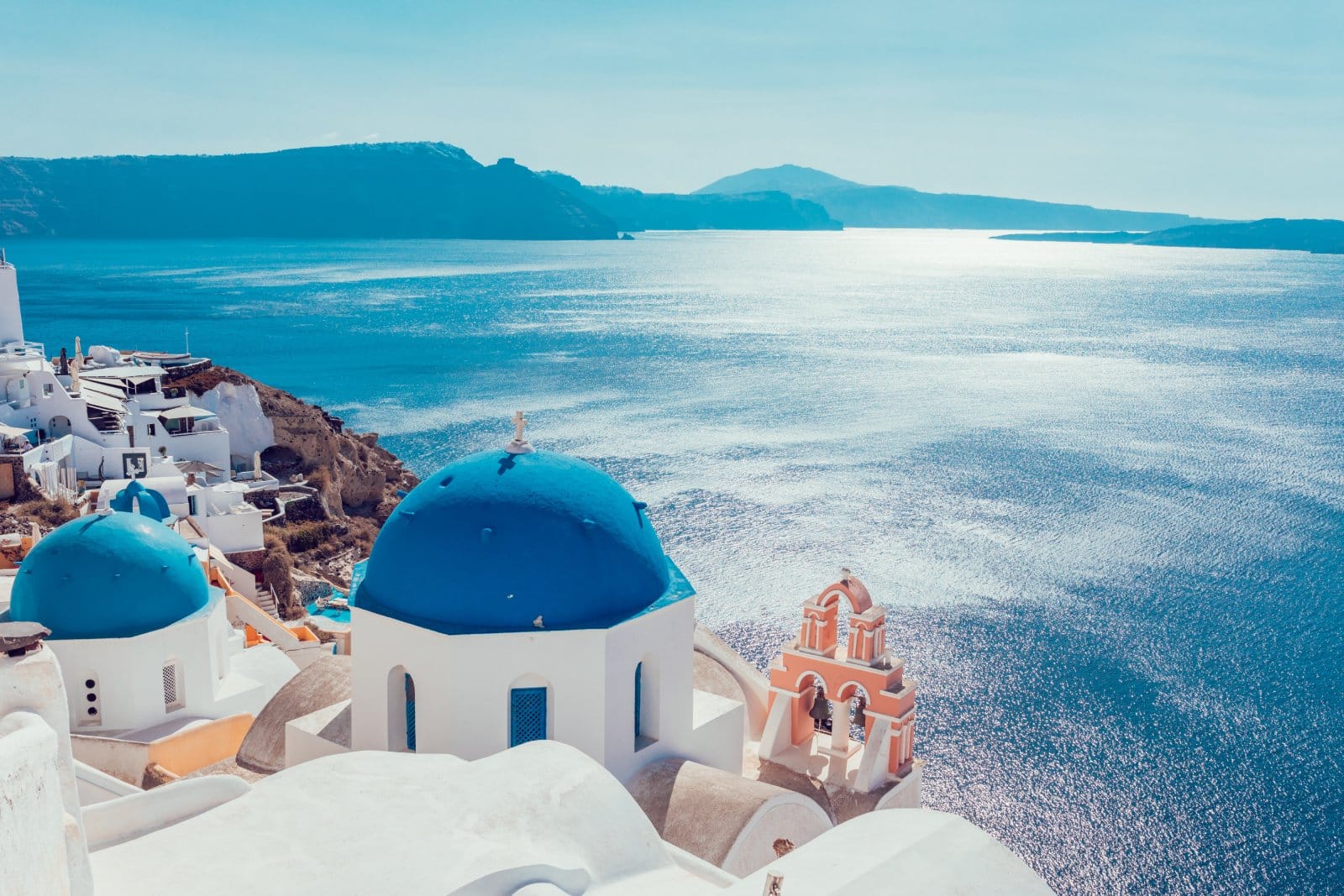 <p class="wp-caption-text">Image Credit: Shutterstock / Anastasios71</p>  <p>Indulge in the dramatic views of blue-domed churches and stunning sunsets that make Santorini a lover’s paradise.</p>