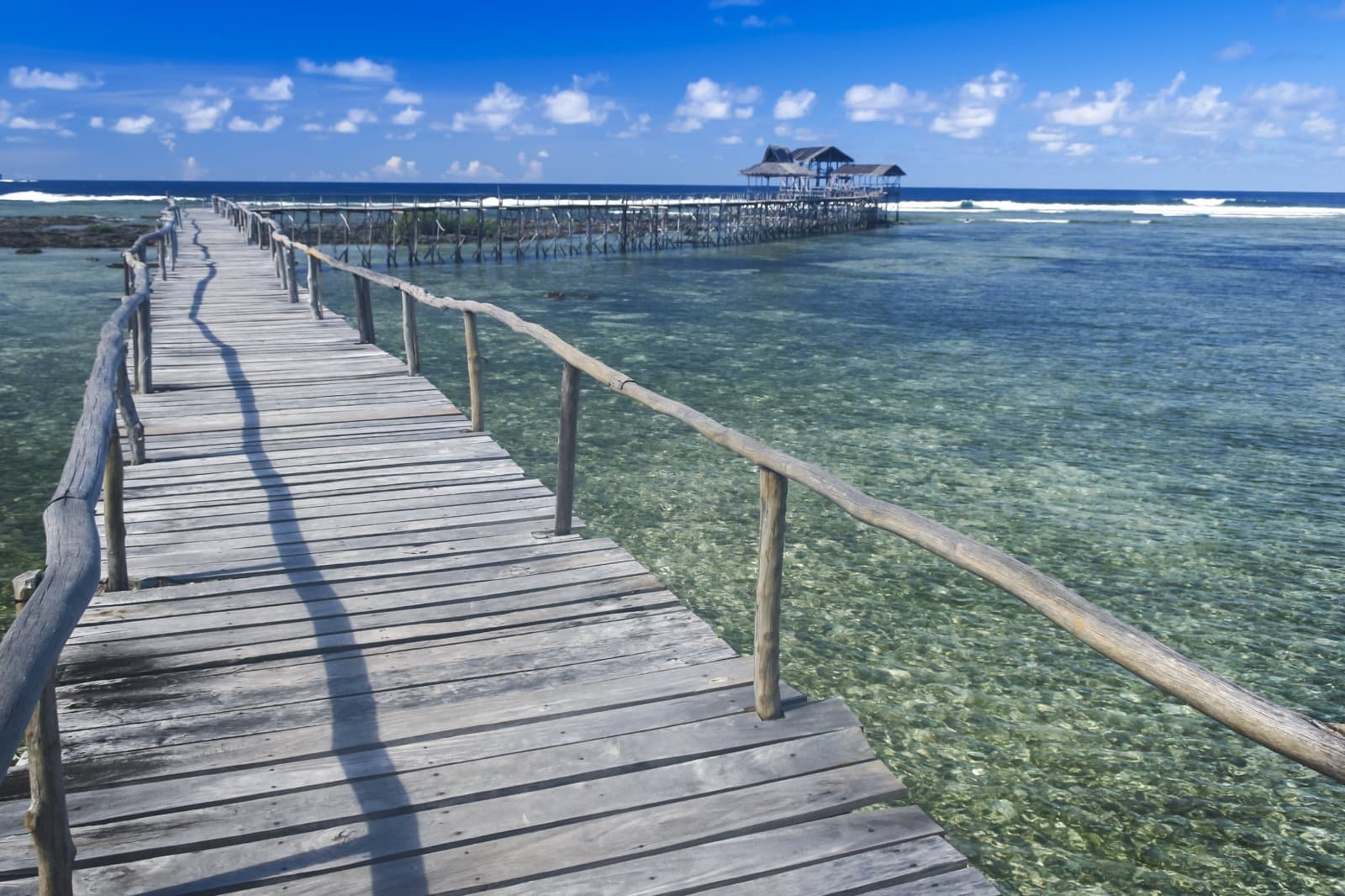 <p class="wp-caption-text">Image Credit: Shutterstock / donsimon</p>  <p><span>Siargao, located in the eastern Philippines, is a haven for surfers, with the famous Cloud 9 reef wave drawing enthusiasts from around the globe. Beyond its surf, Siargao offers a laid-back atmosphere, with stunning coconut palm-lined landscapes, clear tidal pools, and secluded white-sand beaches. The island also serves as a gateway to nearby islets, such as the enchanting lagoons of Sohoton Cove.</span></p>