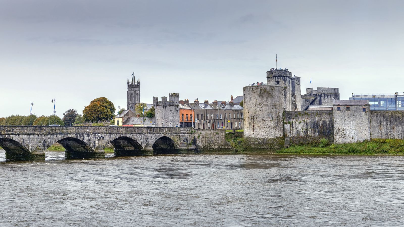 <p>Built by the villain of Robin Hood himself around 1200, King John’s Castle sits on the banks of the River Shannon. It remains in excellent shape to this day, dominating the town of Limerick.</p><p>The entire complex is open to explore for one ticket price. Inside, expect to find historical reenactments, medieval courtyard games, and stunning views.</p><p>But the pièce de resistance is an immersive interactive exhibition that uses 3D models and touch screens to bring 800 years of history to life. Climb the castle towers for an unmatched view of Limerick City.</p>